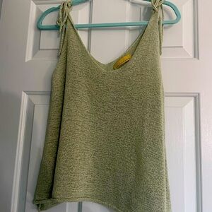 A beautiful green knit camisole with tie straps
